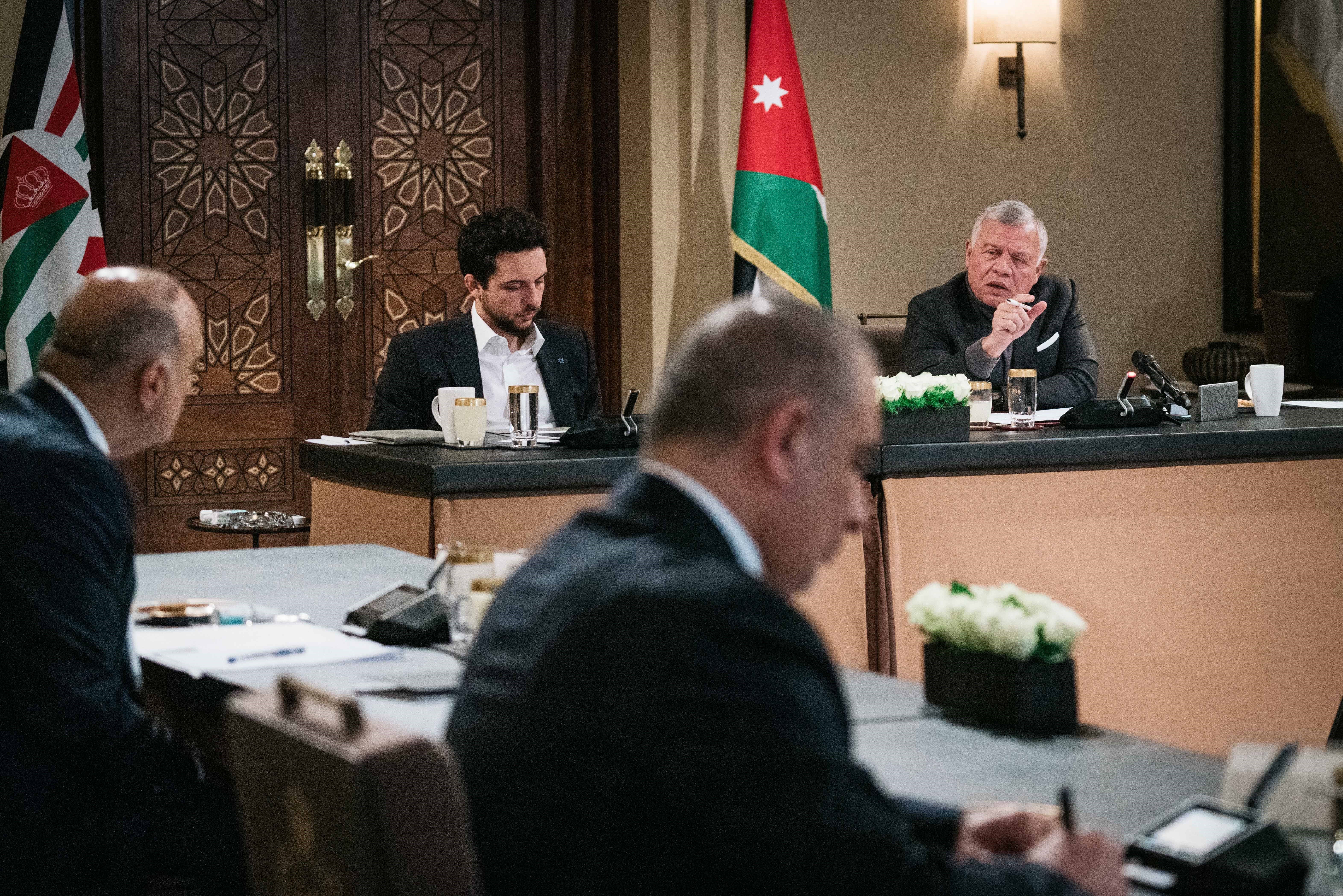 His Majesty King Abdullah is briefed on plans for establishing the new city, during a meeting at Al Husseiniya Palace, attended by HRH Crown Prince Hussein, on Tuesday (Photo courtesy of Royal Court)